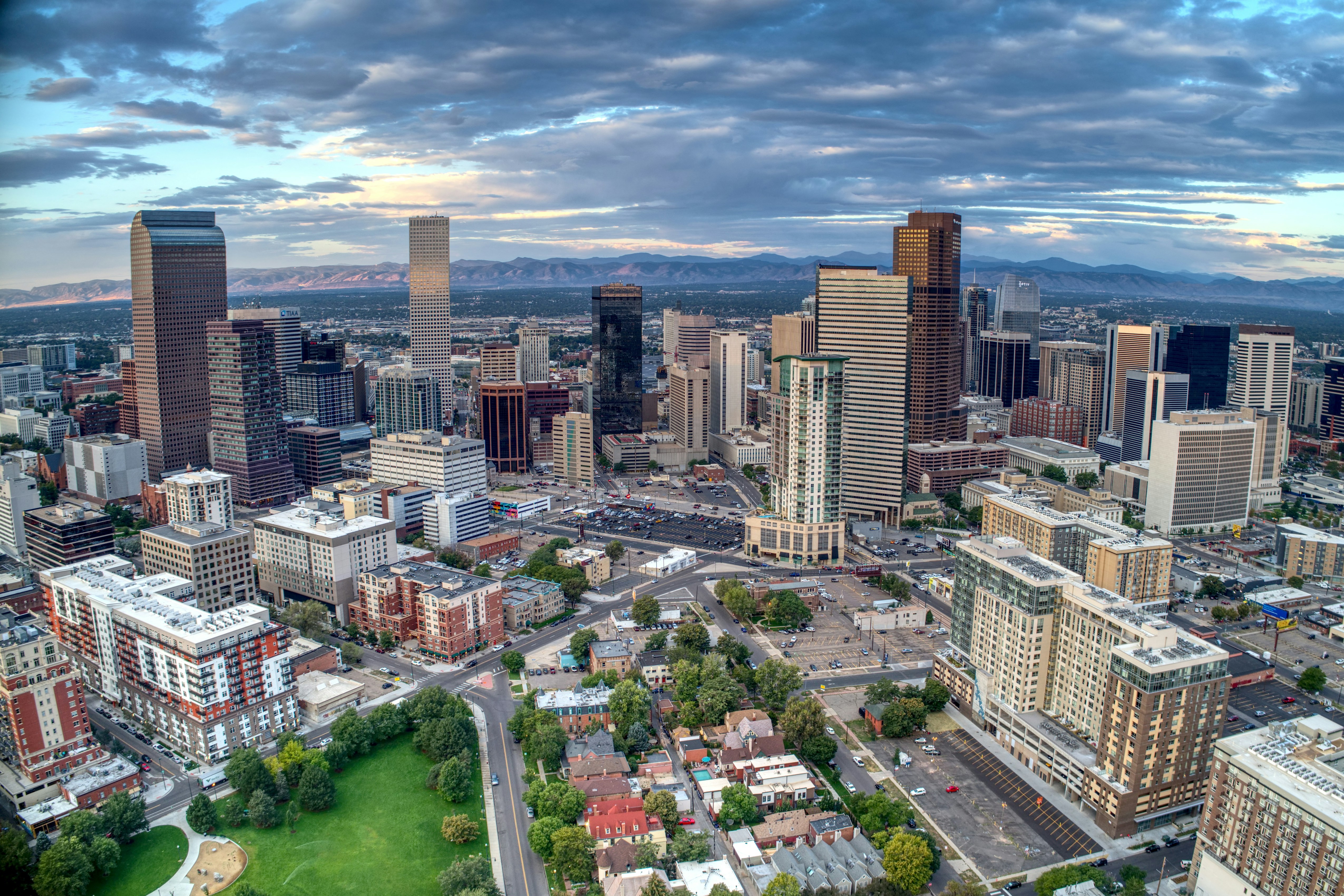 Sunrise over the Denver skyline with the Front Range behind it